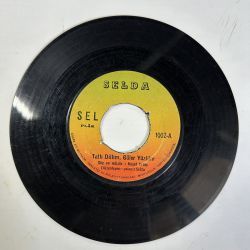 SELDA BAĞCAN - TATLI DİLLİM GÜLER YÜZLÜM / MAHPUSHANELERE GÜNEŞ DOĞMUYOR 45'LİK PLAK